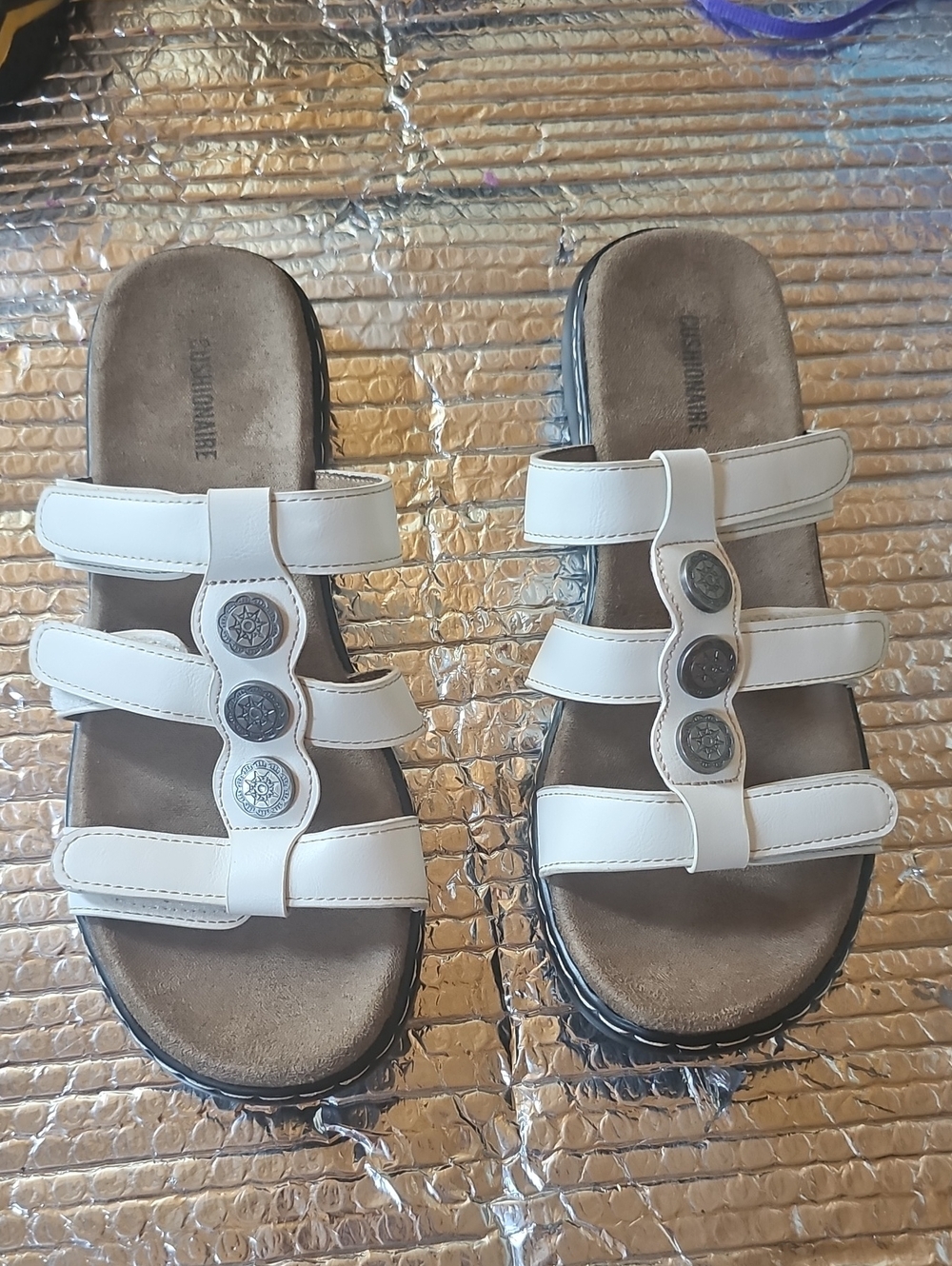 Comfortable Women’s White Three-Strap Sandals with Decorative Medallions